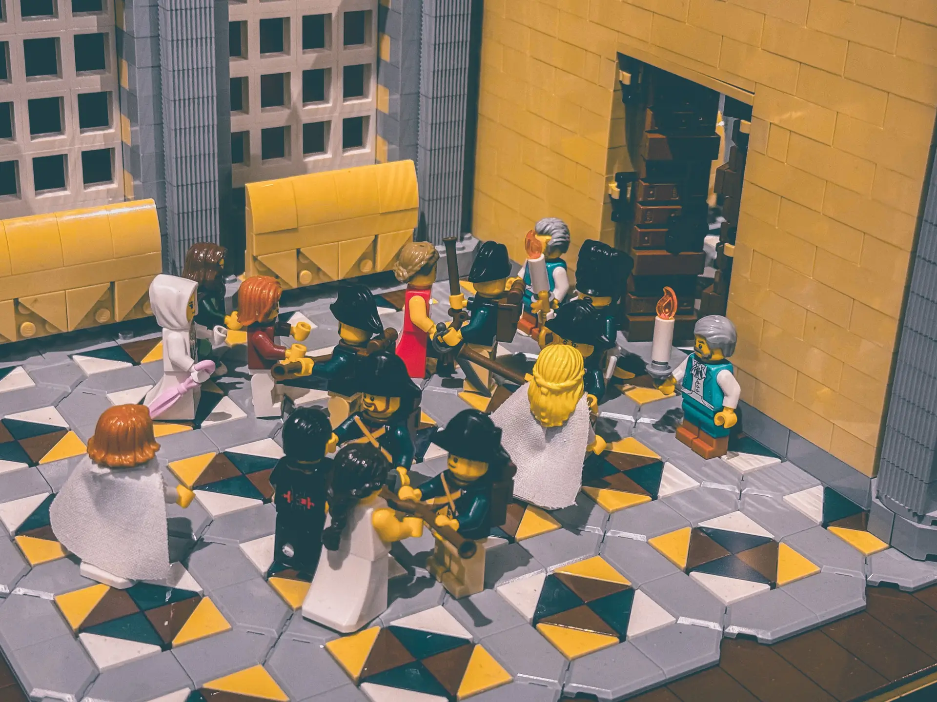 LEGO diorama of the coup of 18 Brumaire: deputies and soldiers crowding a tiled hall as the session breaks up.