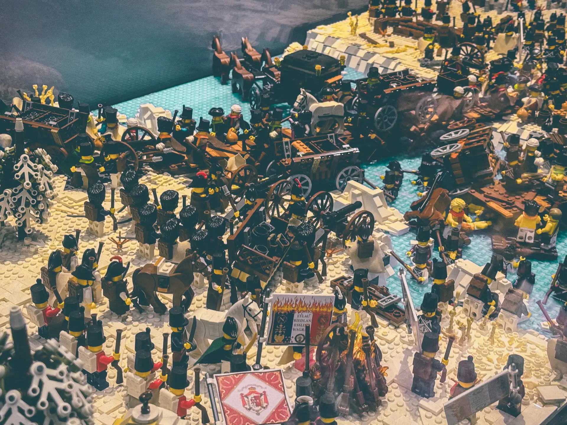 LEGO Berezina build showing carriages, cavalry and baggage crowding the icy river crossing.
