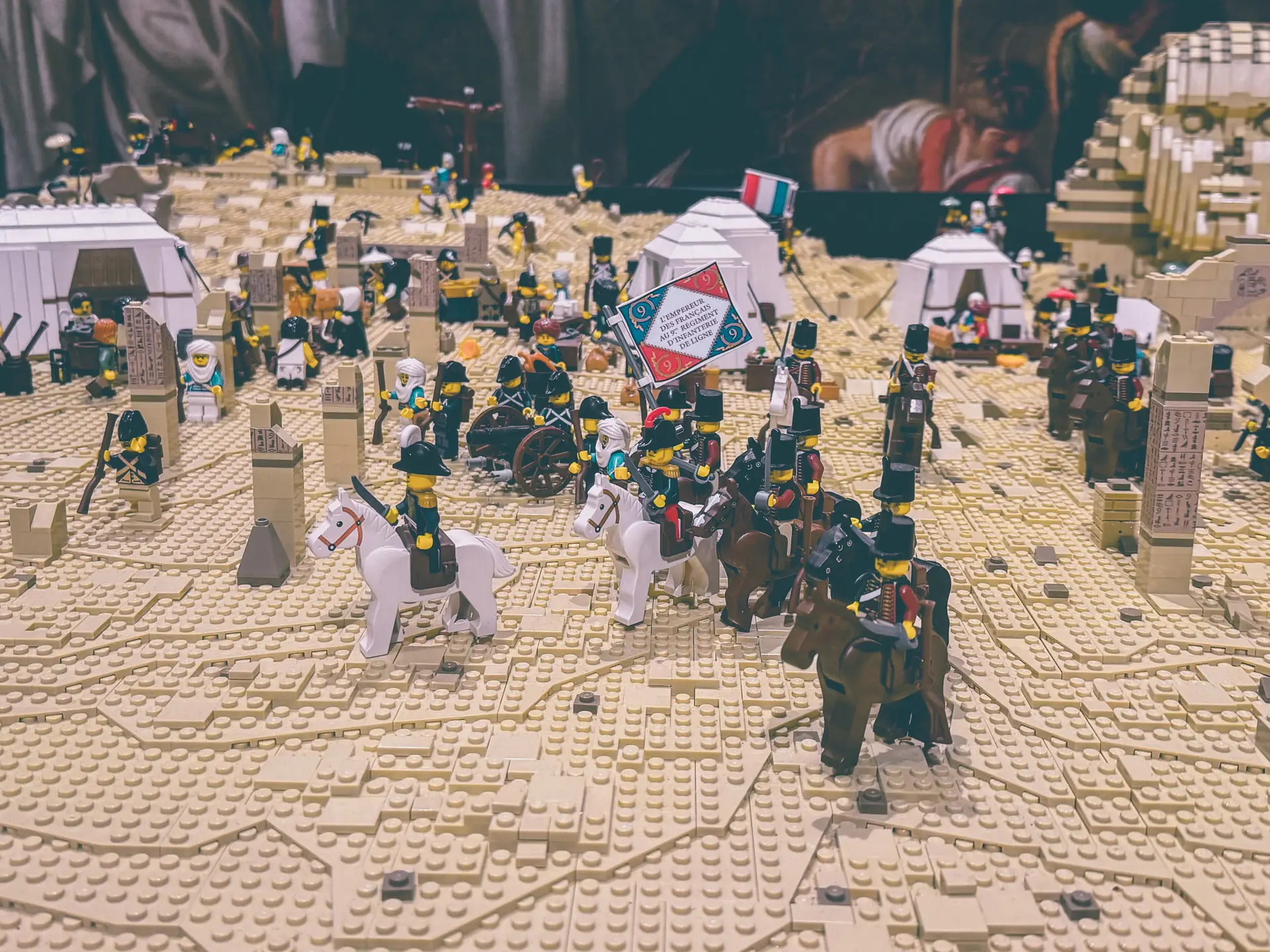 LEGO Egyptian campaign diorama with mounted French officers and cavalry riding past the tents.