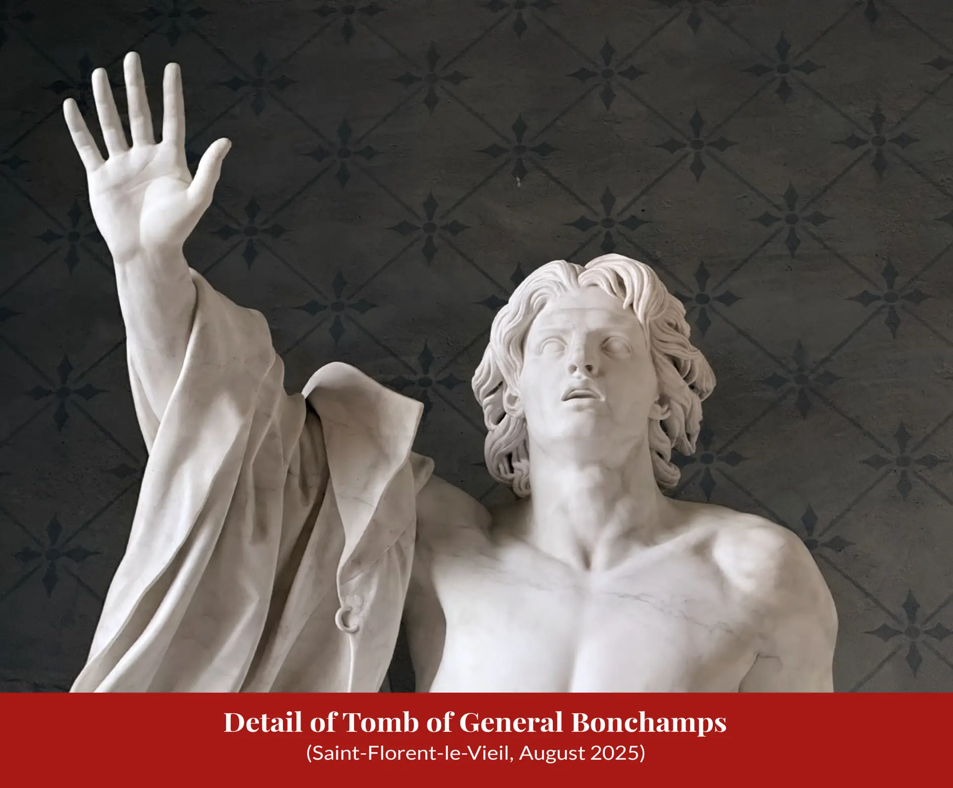Close-up of the marble statue of the dying Bonchamps by David d'Angers, head thrown back, mouth slightly open, right arm raised with open palm
