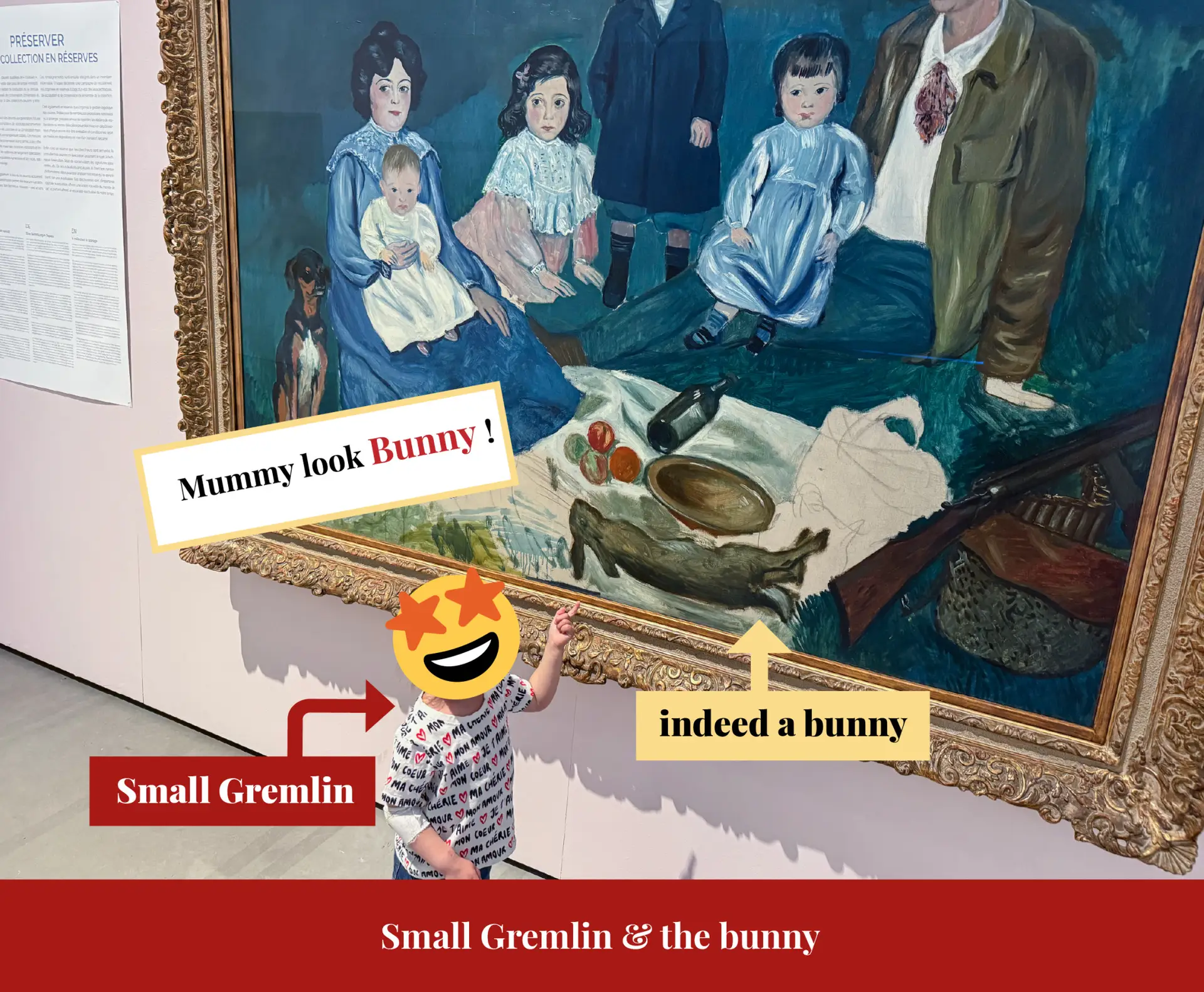 A small child points delightedly at a rabbit in a large blue family group painting at La Boverie, captioned 'Mummy look Bunny!'
